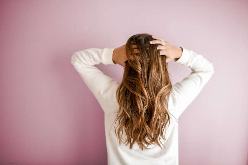 Professional hair styling at Emerald Glow